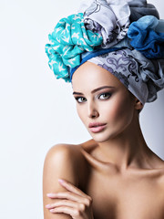 Sexy portrait of a beautiful girl with turban on head.