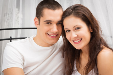 Couple Lying In Bed