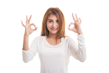 Asian woman show double OK hand sign  and smile.