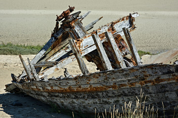 Old rusty wooden shipwreck