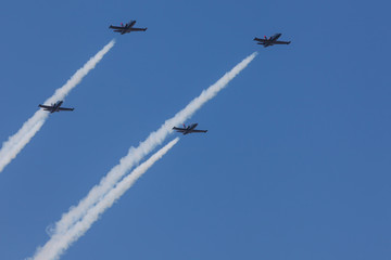 Jet planes flying against a clear, blue, summer sky. Reach for the sky!