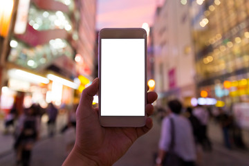 a man using smart phone in akihabara