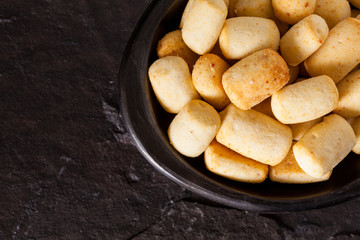 Traditional snack from Colombia called achira on black background