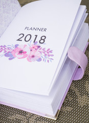 Handmade violet personal planner, notebook with stitched cover, decorated with silver frame, corners and bookmark with a key