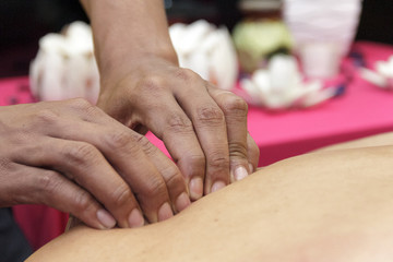 Sports massage - Arm massage - Physical therapist doing massage of arms. Toned image, selective focus set on hands.