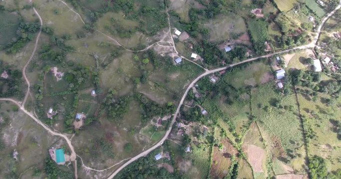Haiti Hinche Farmland High Altitude Birds-eye View Tilt Up to Mountains Aerial
