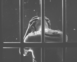 Criminal man stressing on the jailed