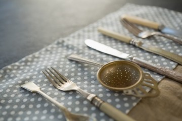 Close up of cutlery on napkin