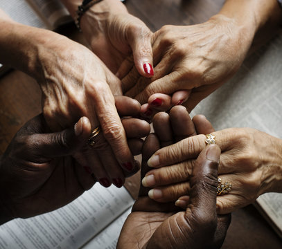 Group Of People Holding Hands Praying Worship Believe