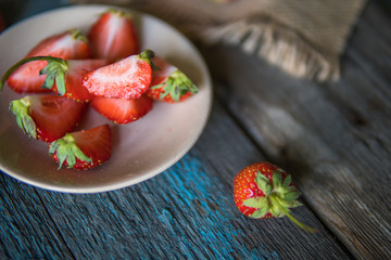 Strawberry on a wooden board in rustic style