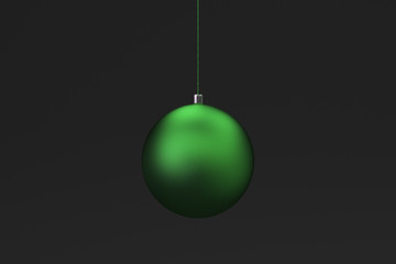 Green christmas balls on black background