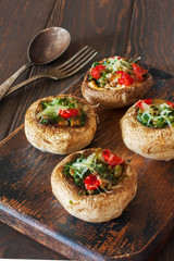 Mushrooms stuffed with vegetable mince and cheese