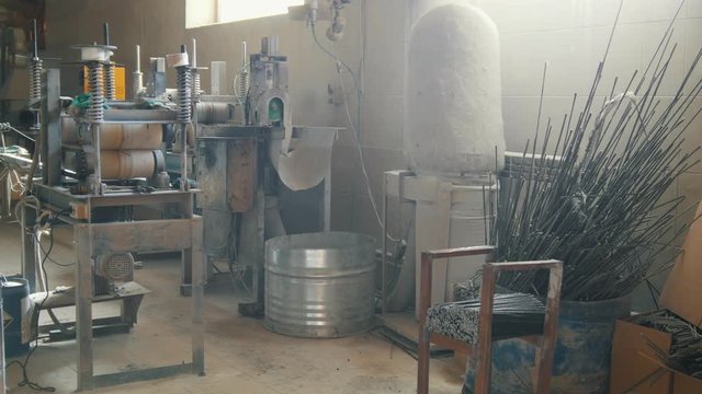 Old scratched soviet plant for producing of fiberglass reinforcement