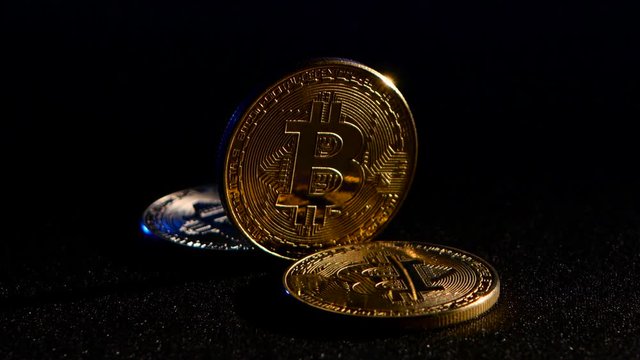 Bitcoin is a new coin for the development of the country's economy. Black background