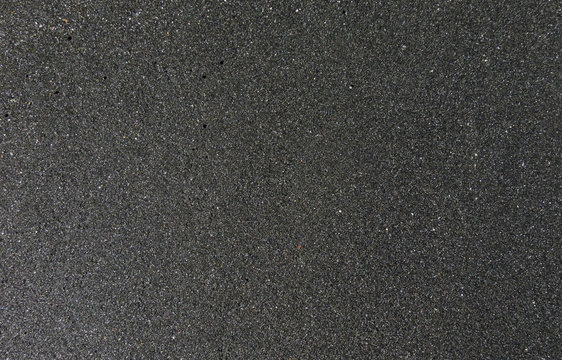 the texture of black sand, concept background, natural background