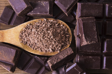 wooden spoon with grated chocolate