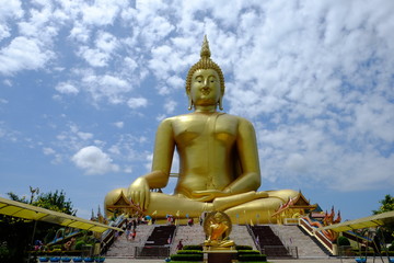 Buddha on the sky background and outdoors