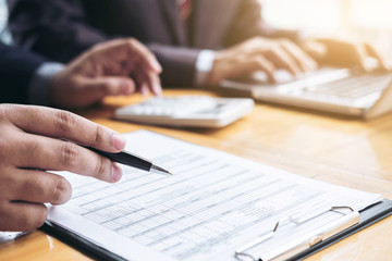 Co working conference, Business team meeting present, investor colleagues discussing new plan financial graph data on office table with laptop and calculator, Finance, accounting, investment