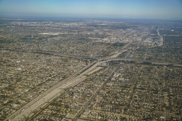 Aerial view of cityscape, view from window seat in an airplane