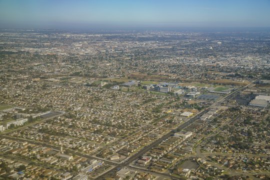 Aerial view of cityscape, view from window seat in an airplane