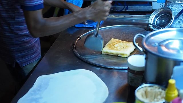 Night Market Thai Local Street Food Stall: Roti Pancake Cutting On Hot Pan In Shop Cart