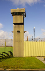 The high observation towers and security fencing at the entrance to the Magilligan Prison in County...