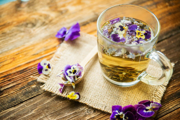 herbal tea on a white wooden background