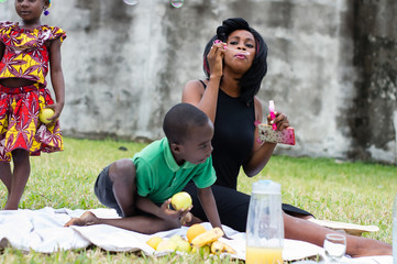 mother and son doing a picnic
