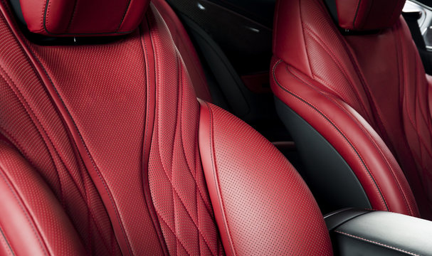 Modern luxury race car red leather interior.