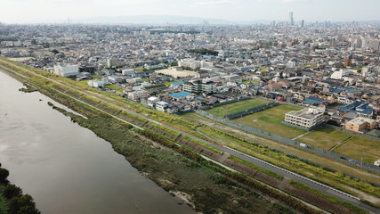 Fototapeta na wymiar 大和川から空撮～大阪市・ハルカスを望む～