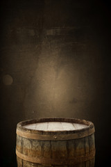 Naklejka na ściany i meble background of barrel and worn old table of wood.