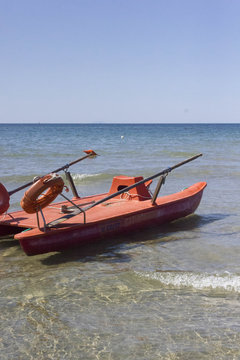 Lifeboat on the seashore of Follonica beach,nodody around