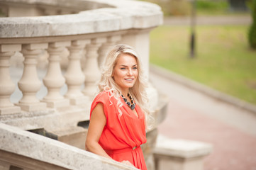 Fototapeta premium woman walking near palace