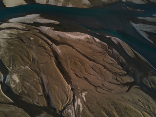 Aerial shot of river delta in valley