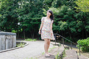 a portrait of beautiful woman in the park