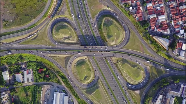 Drone bird's-eye (day) view of a cloverleaf interchange Dom Pedro SP-65 x SP-332 road in Campinas-SP - Brazil