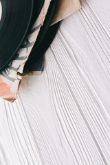 music records on wooden background