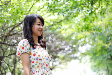 Fototapeta premium a portrait of beautiful woman in the park
