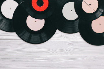 music records on wooden background