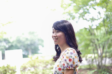 a portrait of beautiful woman in the park