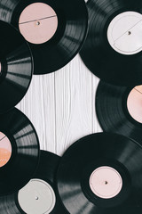 music records on wooden background