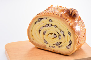 bake bread with wood grain on a block wood isolated on white background