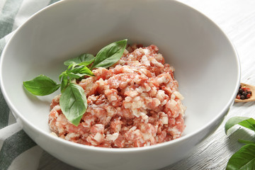 Bowl with ground turkey for delicious meatloaf, closeup