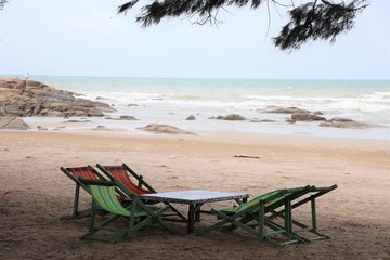 Bed beach and chairs without umbrella at Rayong beach Thailand