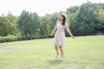 a portrait of beautiful woman in the park