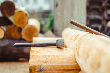 the hammer rests on the beam