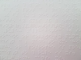 braille dots on a piece of paper