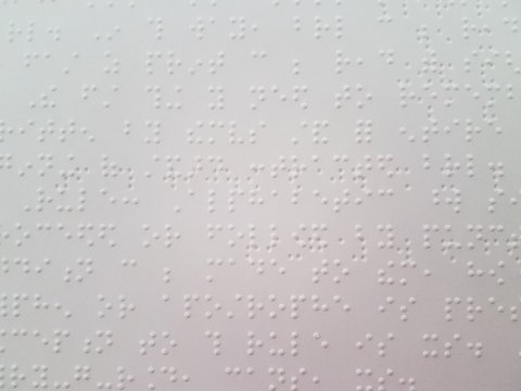 braille dots on a piece of paper