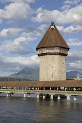 Lucerne with wooden bridge called chapel bridge