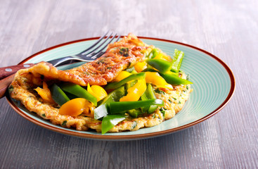 Spinach and feta omelet with yellow and green bell pepper